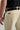 A person wearing cappuccino cropped dynamic stretch golf trousers