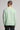 A man wearing a crew neck sweatshirt in green