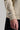 A man wearing a crew neck sweatshirt in softstone colour