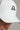 A person wearing a golf cap in white colour, size fitted