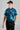 A person wearing a golf polo with floral Print