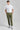 A person wearing green woven golf joggers