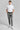 A person wearing golf trousers in grey