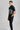 Man wearing golf polo Black and steel grey