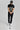 Man wearing golf polo Black and steel grey