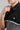 Man wearing golf polo Black and steel grey