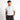 A man wearing a light gray short-sleeve polo shirt with a small white embroidered logo on the chest, paired with black trousers, standing against a plain white studio background.