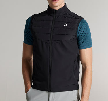 A male model wearing a golf gilet in black