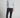 A man wearing black stretch blue golf trousers
