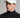 A person wearing a golf cap in white colour, size fitted