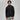 Man wearing a black pullover and gray pants on a white background