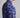 Blue camouflage-patterned shirt with a brand logo on a gray background