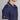 Navy polo shirt with white accents and ATSG logo on a gray background