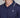 Navy blue polo shirt with a white logo on a gray background