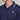 Navy blue polo shirt with a white logo on a gray background